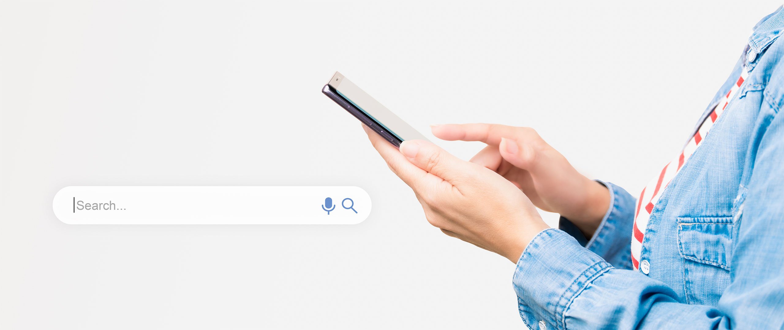 Person searching on smart phone next to white search bar illustration.